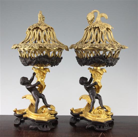 A pair of Regency style ormolu and patinated bronze pot pourri, 15in.